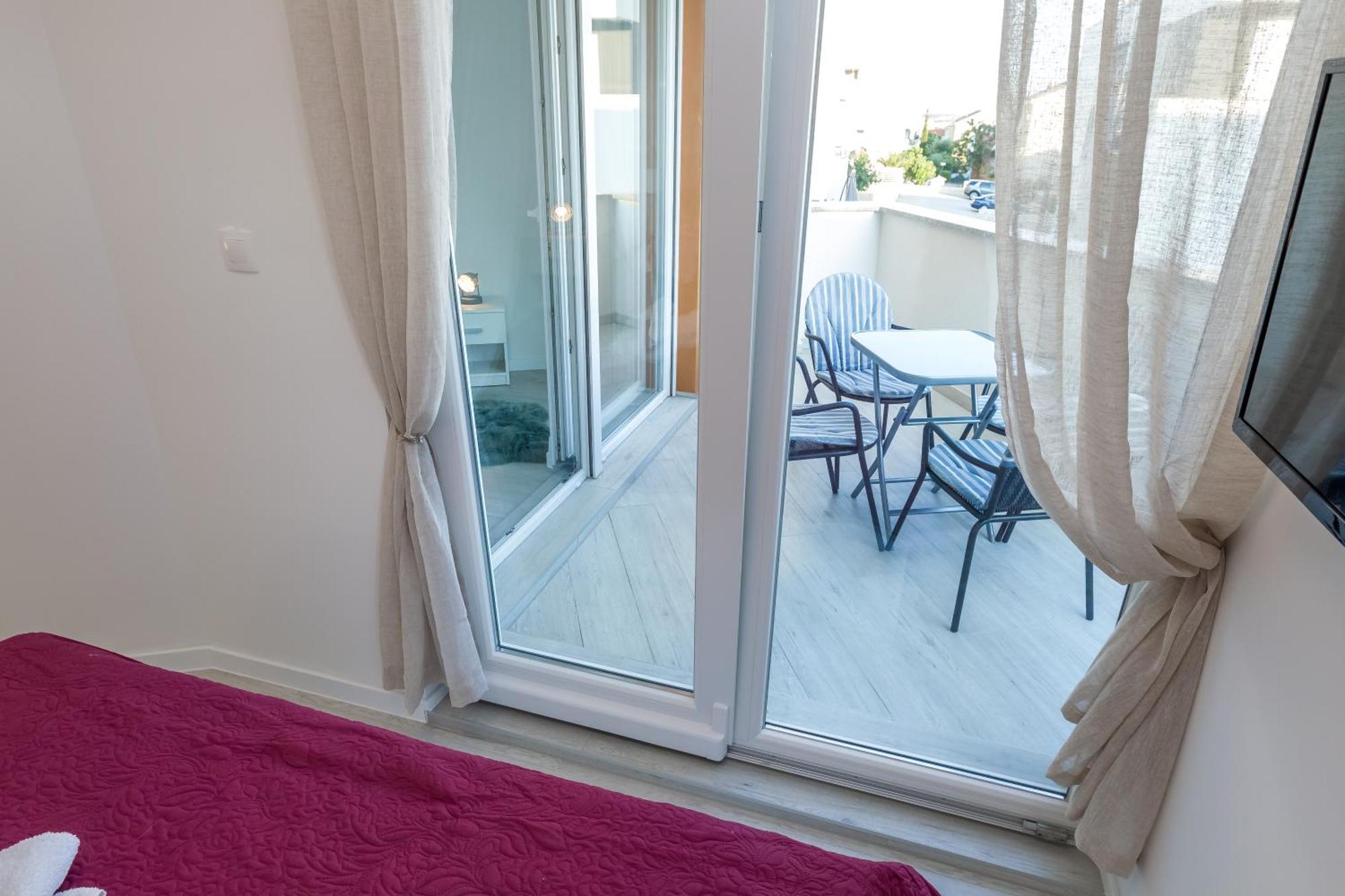 Apartments Tomana Novalja Phòng bức ảnh